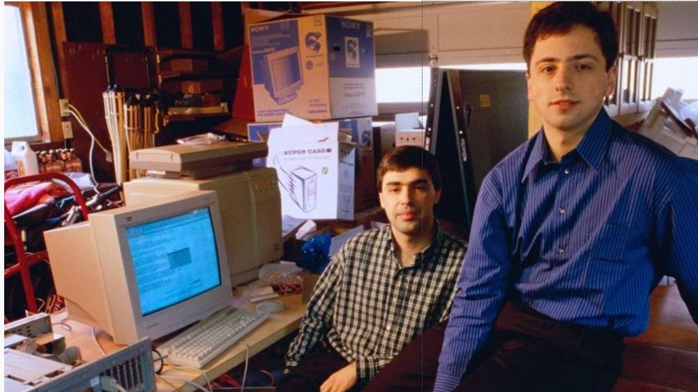 Sergey Brin and Larry Page, co-founders of Google, in their first office (1998) - Image: unknown source